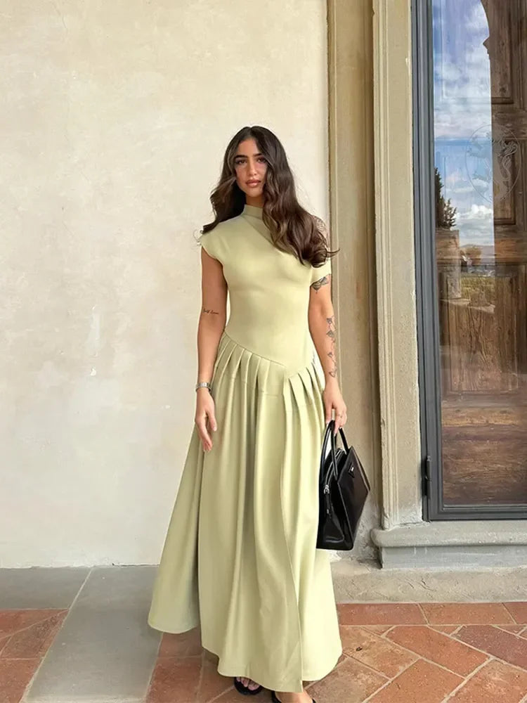 Marcella | Maxikleid mit hohem Kragen und Faltenrock